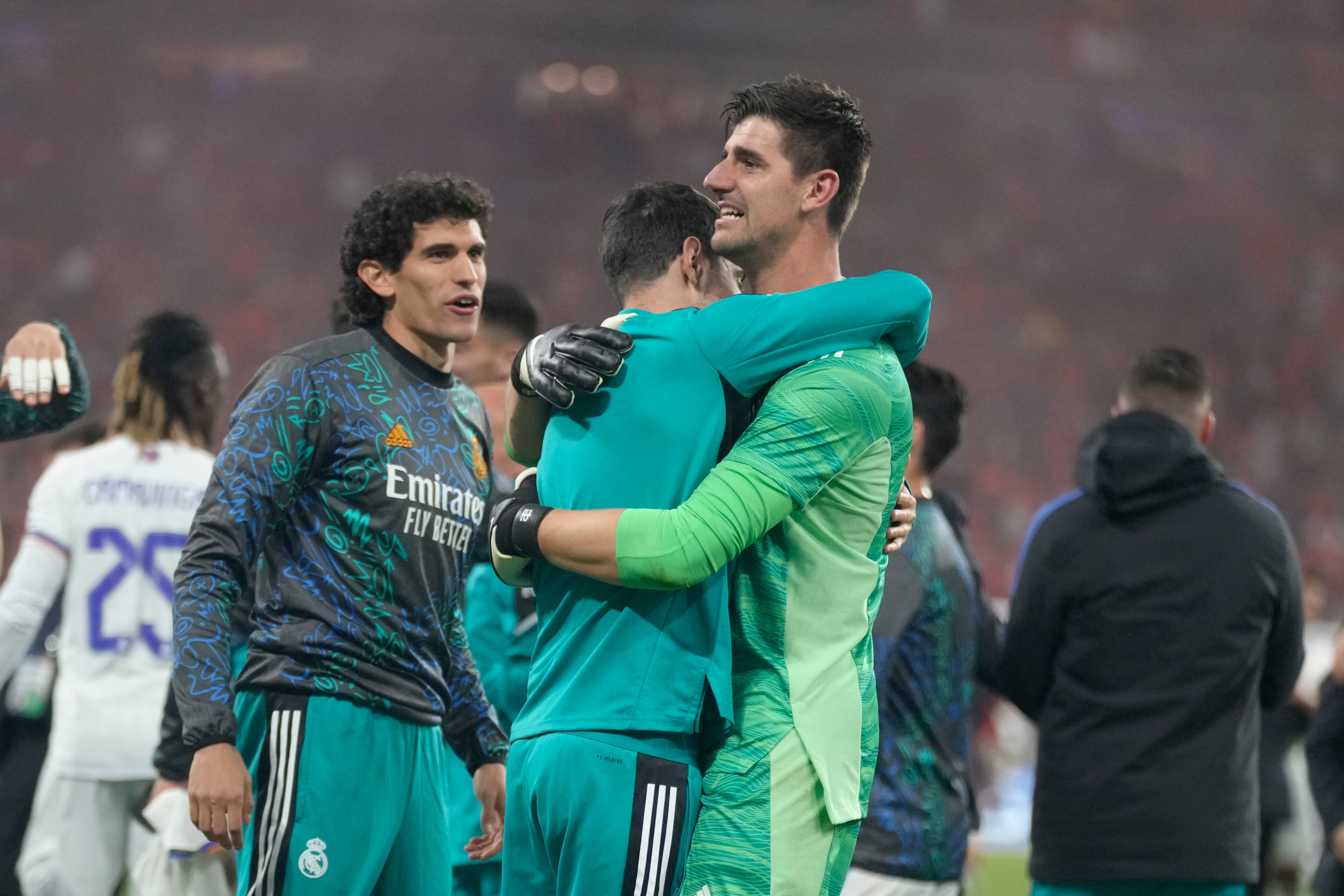 Real Madrid's goalkeeper Thibaut Courtois celebrates winning the Champions League final soccer match between Liverpool and Real Madrid at the Stade de France in Saint Denis near Paris, Saturday, May 28, 2022. Real Madrid won 1-0. (AP Photo/Kirsty Wigglesworth)