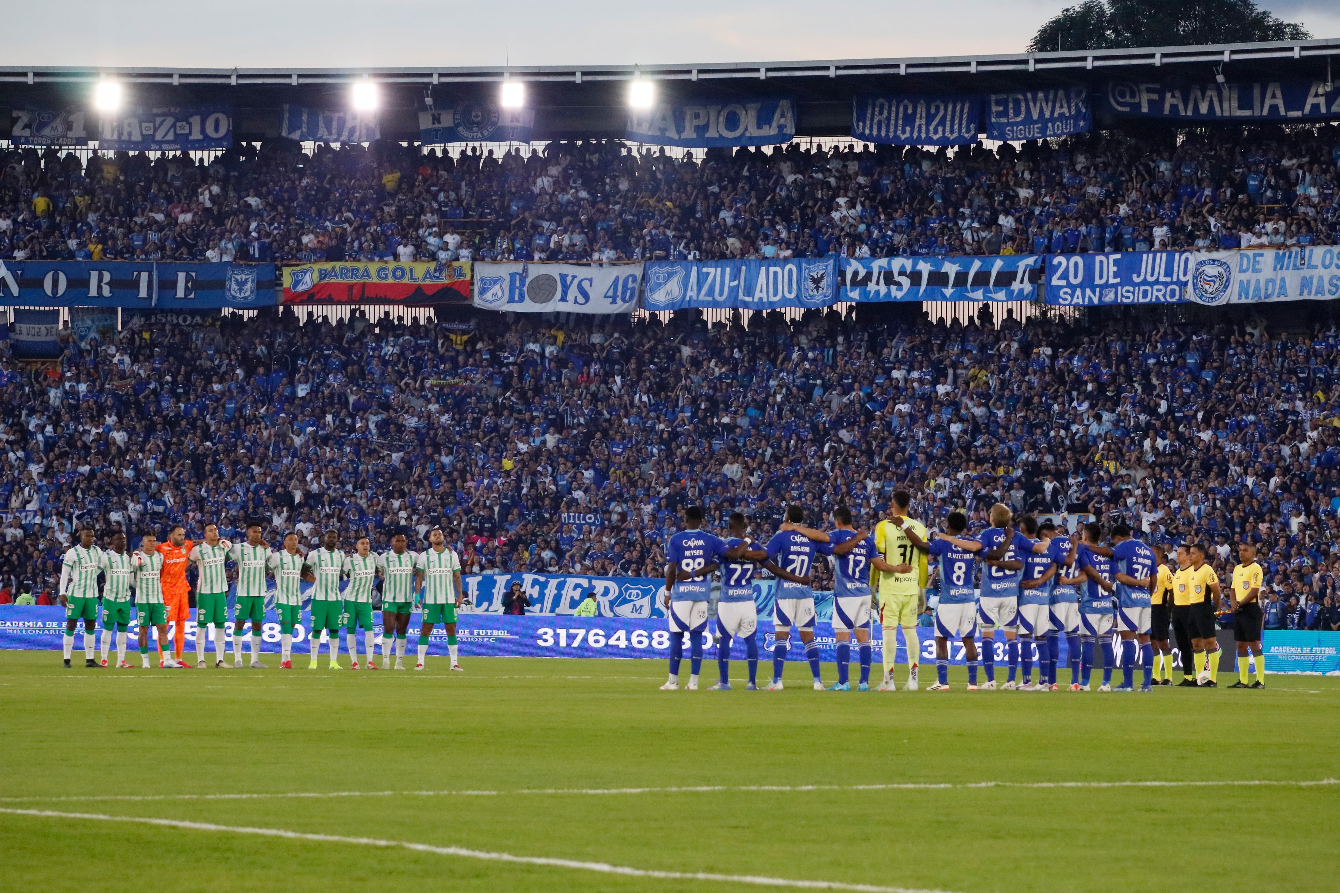 Atletico Nacional players (L) face front to front with Millonarios F.C players (R) during the BetPlay Dimayor League match between Millonarios F.C and Atletico Nacional in Bogota, Colombia's El Campin Stadium April 13, 2025. (Photo by: Jorge Londono/Long Visual Press/Universal Images Group via Getty Images)