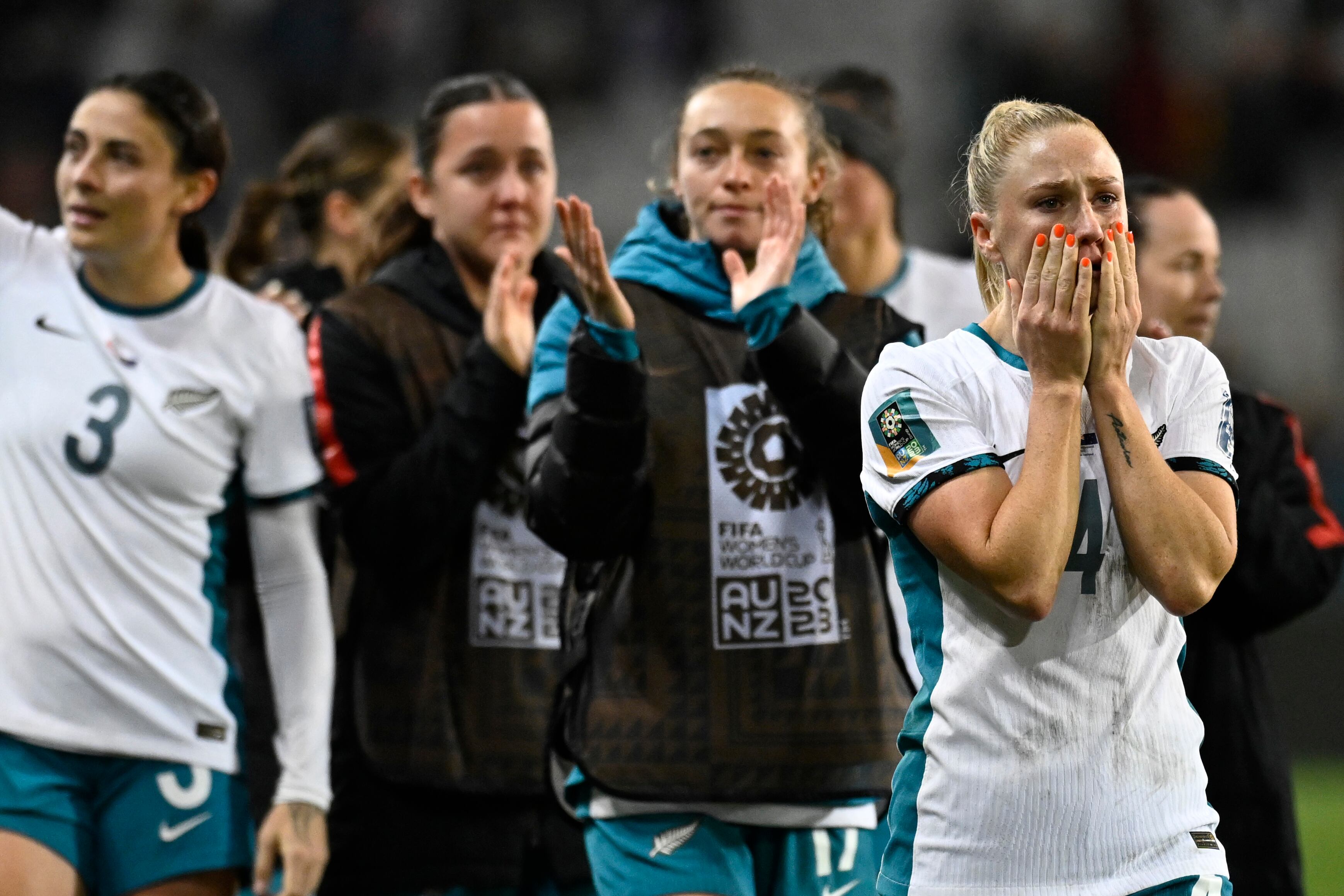 New Zealand's C.J. Bott covers her face after the Women's World Cup Group A soccer match between New Zealand and Switzerland in Dunedin, New Zealand, Sunday, July 30, 2023. (AP Photo/Andrew Cornaga)