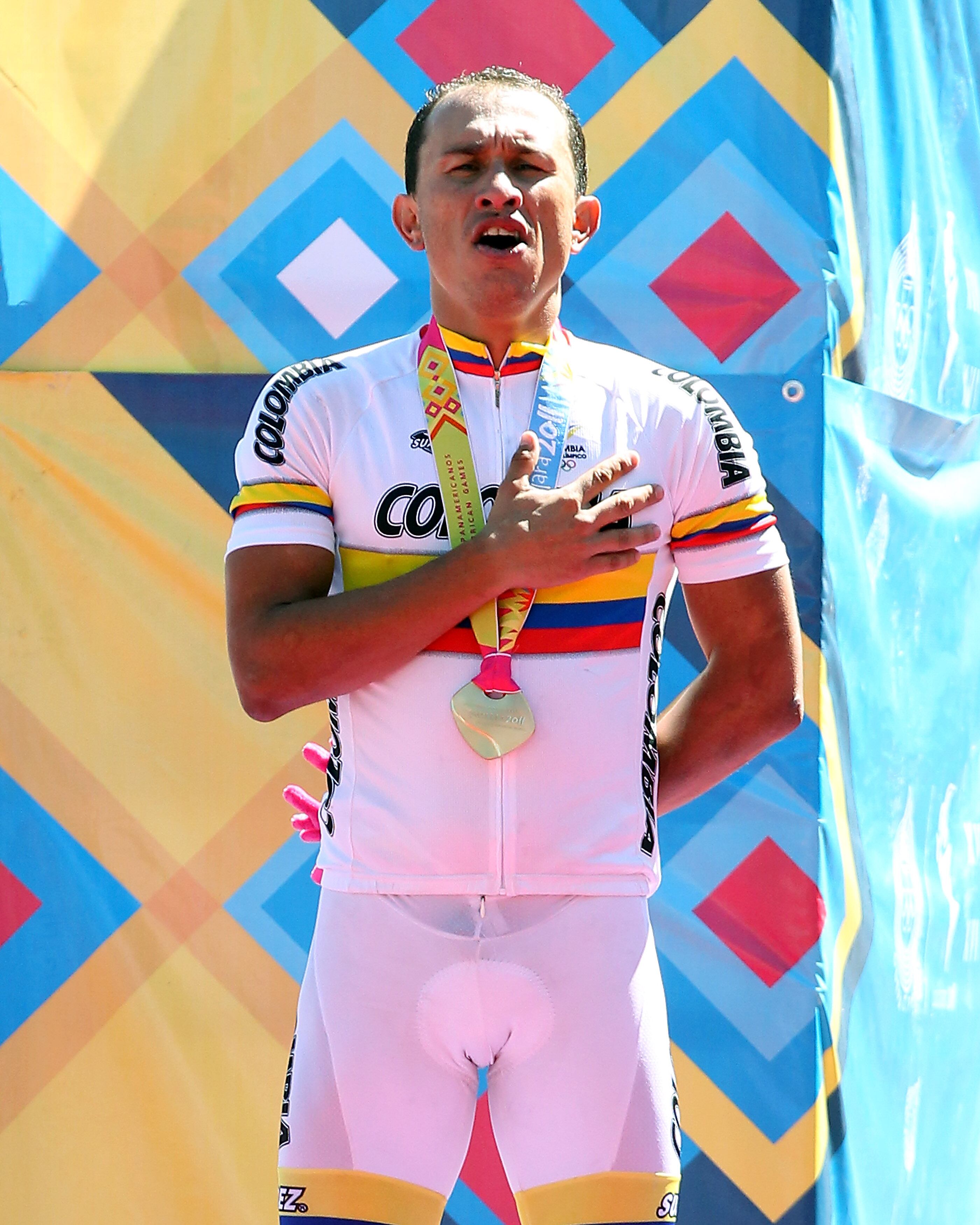 GUADALAJARA, MEXICO - OCTOBER 16:  Marlon Alirio Perez of Colombia stands on the podium after winning gold in the Men's Individual Time Trial at the Time Trial Cycling Circuit during Day Two of the XVI Pan American Games on October 16, 2011 in Guadalajara, Mexico.  (Photo by Scott Heavey/Getty Images)