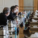 Director General of International Atomic Energy Agency, IAEA, Rafael Mariano Grossi, second left, meets with Iranian Foreign Minister Mohammad Javad Zarif, second right, in Tehran, Iran, Sunday, Feb. 21, 2021.