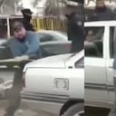 Hombre destruyendo su carro en Argentina
