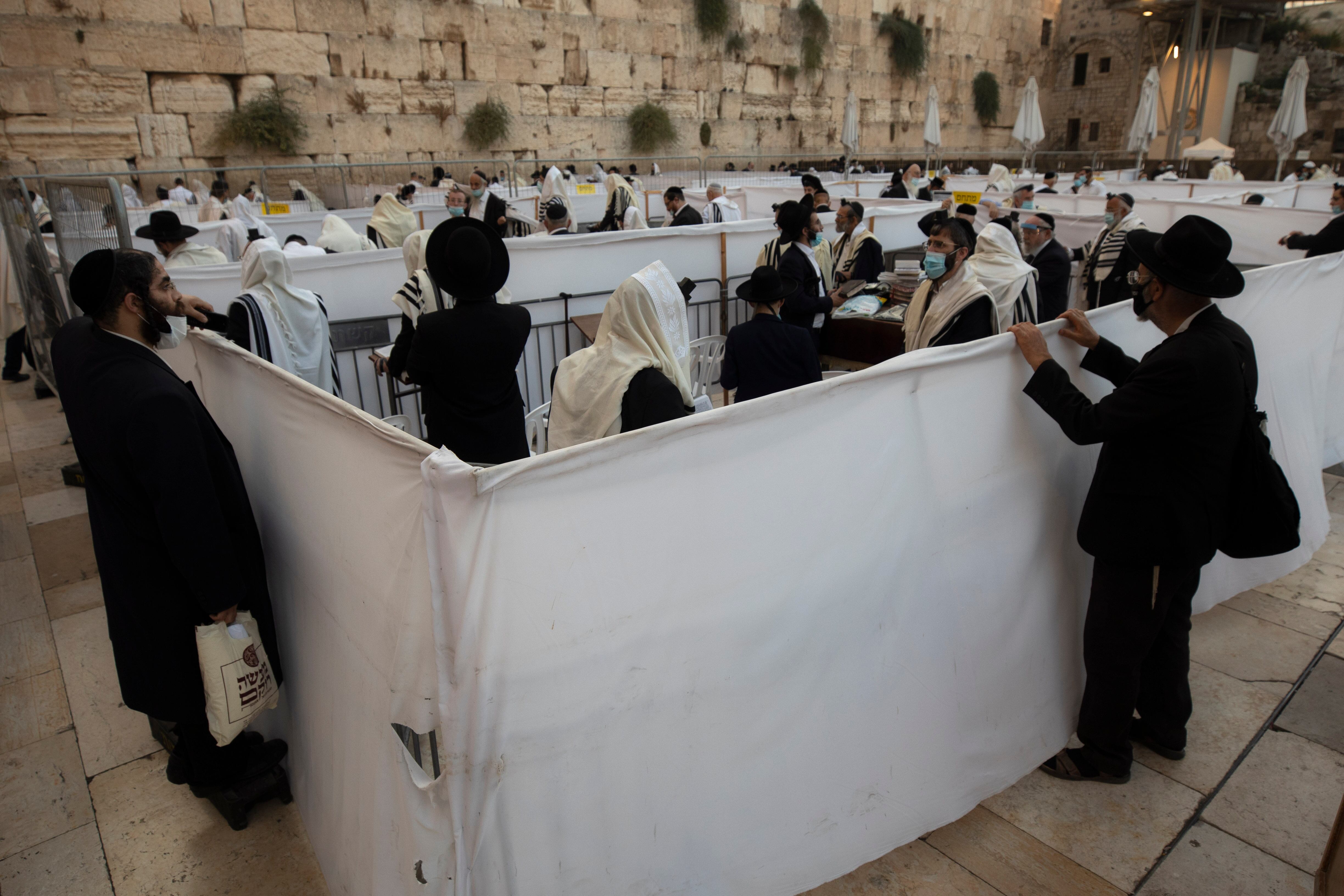 Ultra-Orthodox Jewish men pray ahead of the Jewish new year at the Western Wall, the holiest site where Jews can pray in Jerusalem's old city