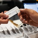 Colombia migration officers deliver the temporary working and residence permits for Venezuelan migrants on January 27, 2022. Colombia Migration is organizing mass events to grant more than 70.000 temporary permissions ID's to Venezuelan migrants in the span of 7 days. (Photo by: Chepa Beltran/VWPics/Universal Images Group via Getty Images)