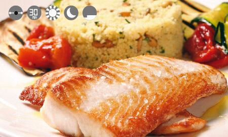 Filete de tilapia con cous cous cítrico.