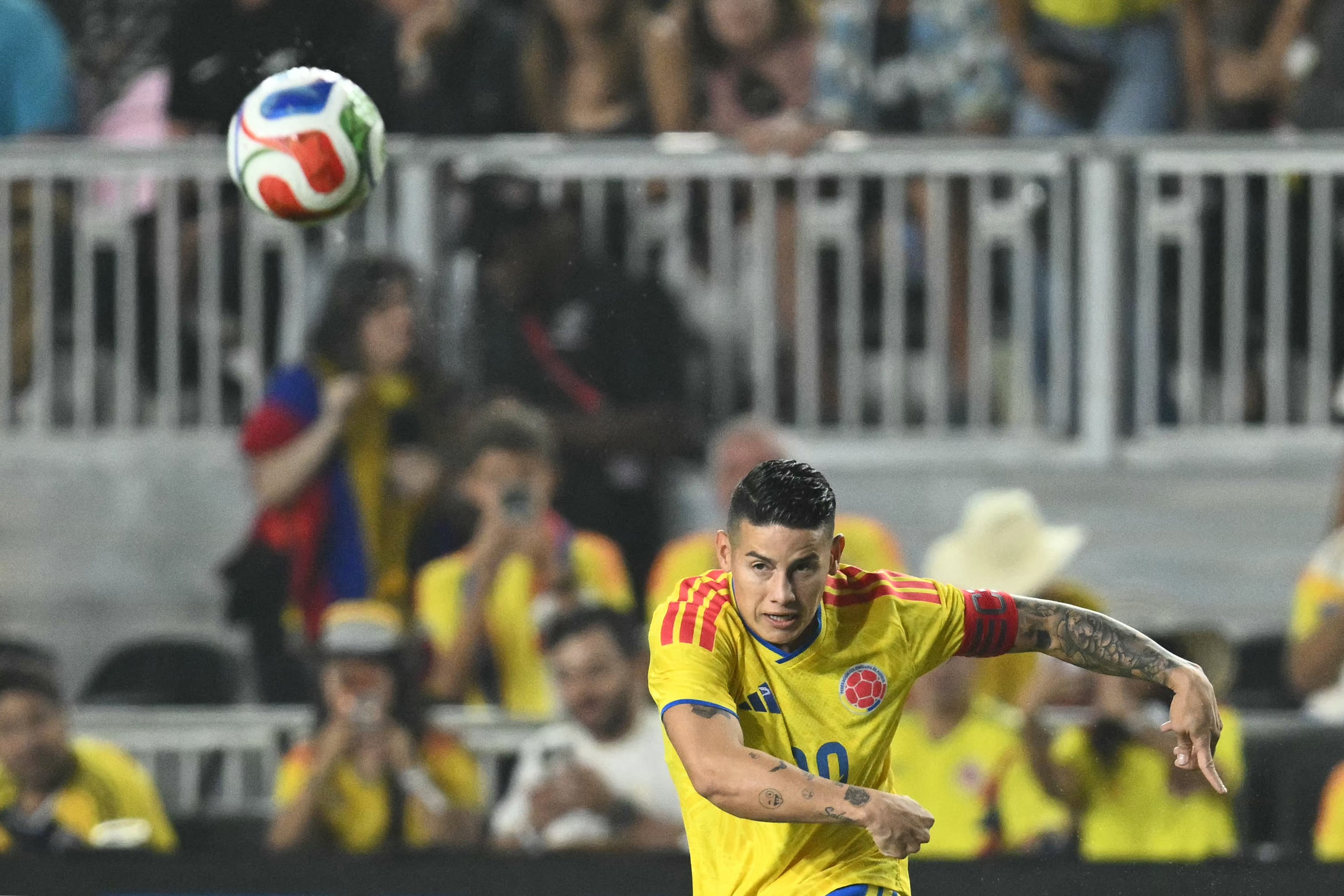 Colombia's midfielder #10 James Rodriguez eyes the ball during the international friendly football match between Colombia and New Zealand at Chase Stadium in Fort Lauderdale, Florida, on November 15, 2025. (Photo by CHANDAN KHANNA / AFP)