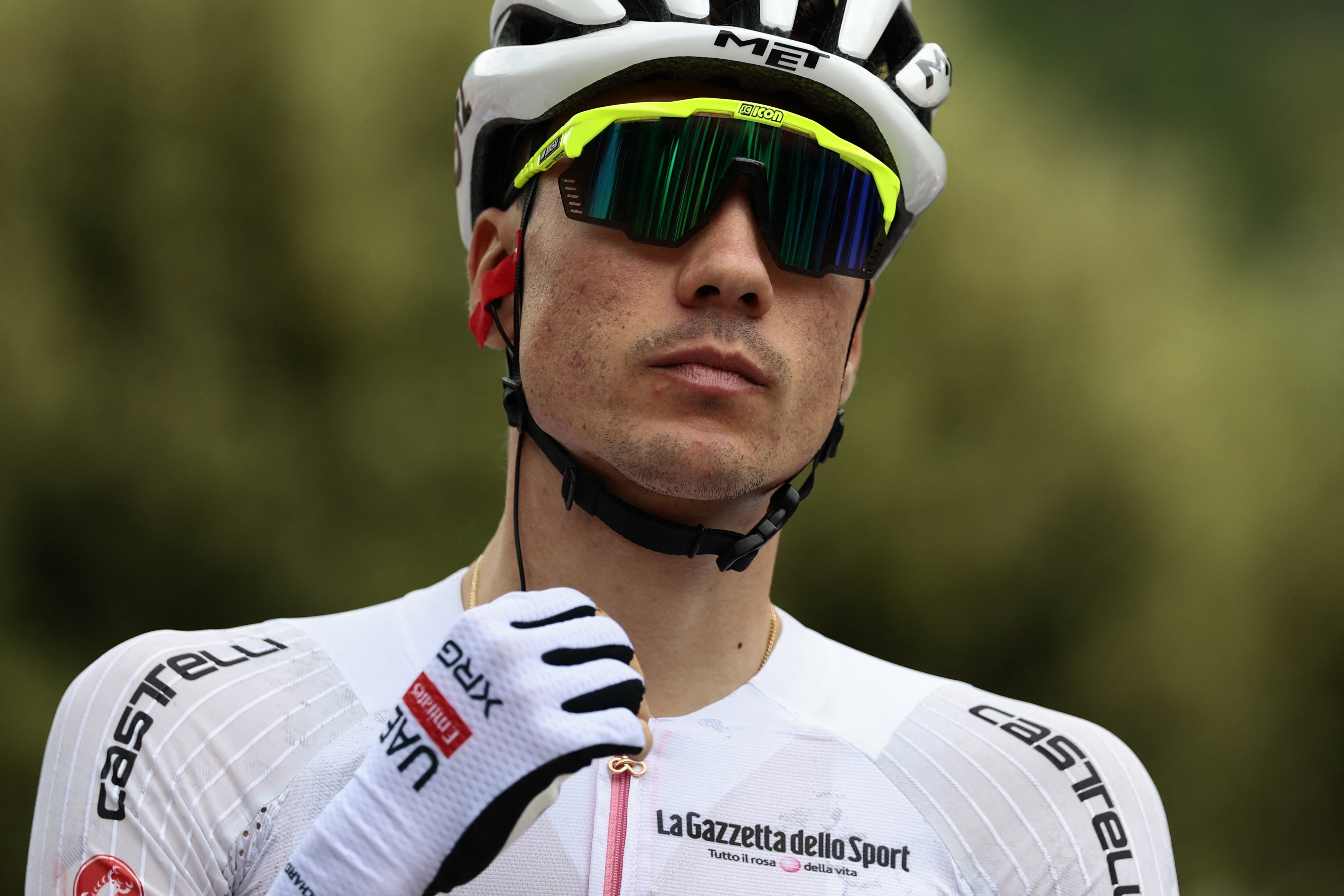 UAE Team Emirates XRG's Spanish rider Juan Ayuso waits for the start of the 9th stage of the 108th Giro d'Italia cycling race of 181kms from Gubbio to Siena on May 18, 2025. (Photo by Luca Bettini / AFP)
