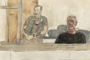 This court sketch made on September 2, 2024 shows defendant Dominique P. (R) during his trial in which he is accused of drugging his wife for nearly ten years and inviting strangers to rape her at their home in Mazan, a small town in the south of France, at the courthousein Avignon. The case involves 50 co-defendants. The defendants, 18 of whom are on remand, are men aged between 21 and 68 at the time of the events. (Photo by Benoit PEYRUCQ / AFP)
