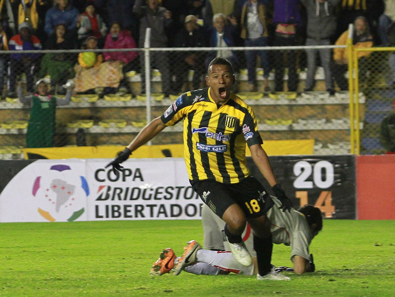 LA PAZ, BOLIVIA - APRIL 17: Jair Reinoso of The Strongest celebrates a scored goal during a match between The Strongest and Defensor Sporting as part of the Copa Bridgestone Libertadores 2014 at Hernando Siles Stadium on April 17, 2014 in La Paz, Bolivia. (Photo by Jose Luis Quintana/LatinContent via Getty Images)