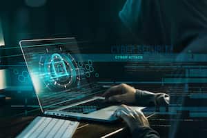 Cyber security concept. Internet crime. Hacker working on a code and network with lock icon on digital interface virtual screen dark digital background.
