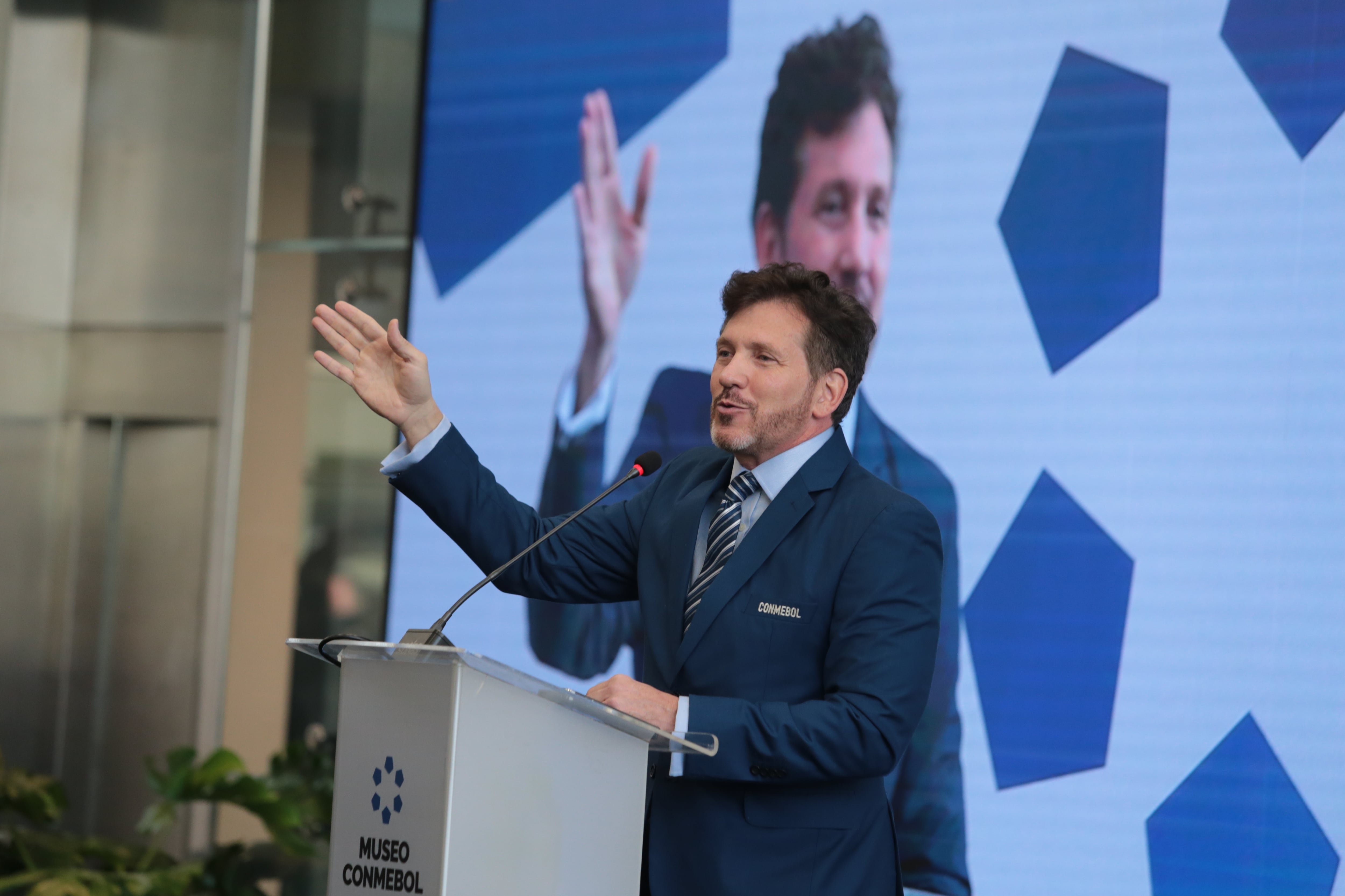 LUQUE, PARAGUAY - MARCH 18: President of CONMEBOL Alejandro Dominguez gives a speech during the re-inauguration of the Football Museum at CONMEBOL headquarters on March 18, 2024 in Luque, Paraguay. (Photo by Christian Alvarenga/Getty Images)