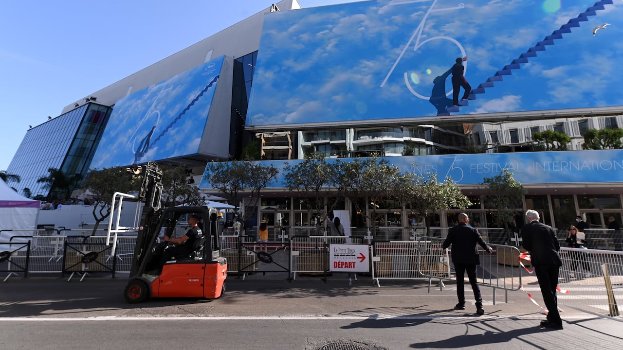 CANNES, FRANCE - MAY 16: The Cannes Film Festival 2022 poster paying tribute to The Truman Show is displayed at the The Palais des Festivals ahead of the 75th annual Cannes film festival on May 16, 2022 in Cannes, France. (Photo by Joe Maher/Getty Images)