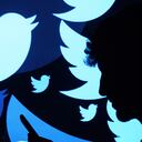 LONDON, ENGLAND - AUGUST 09: In this photo illustration, the logo for the Twitter social media network is projected onto a man on August 09, 2017 in London, England. With around 328 million users worldwide, Twitter has gone from a small start-up in for the public 2006 to a broadcast tool of politicians and corporations in 2017. (Photo by Leon Neal/Getty Images)