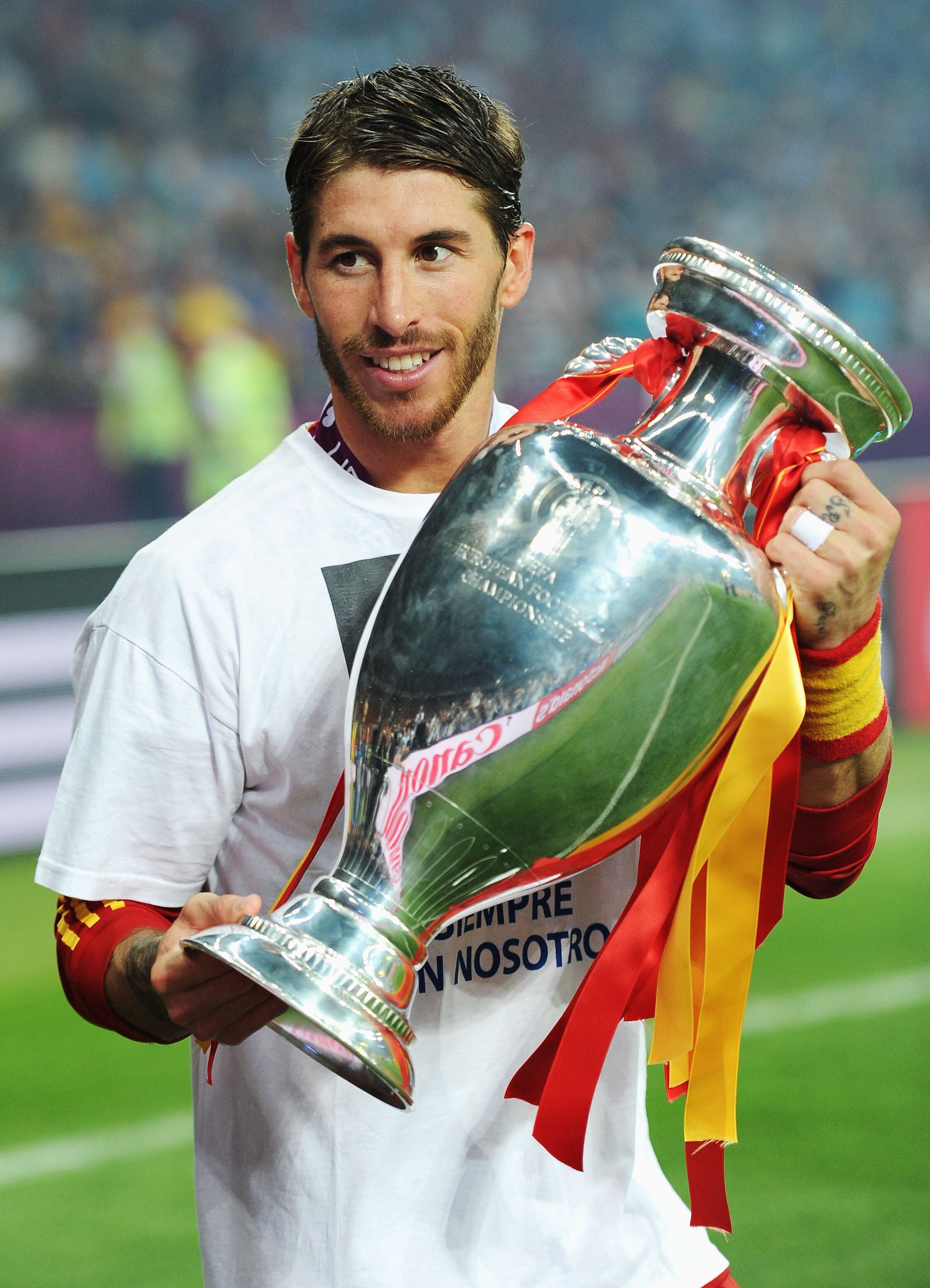 KIEV, UKRAINE - JULY 01:  Sergio Ramos of Spain poses with the trophy following victory in the UEFA EURO 2012 final match between Spain and Italy at the Olympic Stadium on July 1, 2012 in Kiev, Ukraine.  (Photo by Jasper Juinen/Getty Images)
