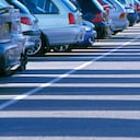 Row of cars in a car park.