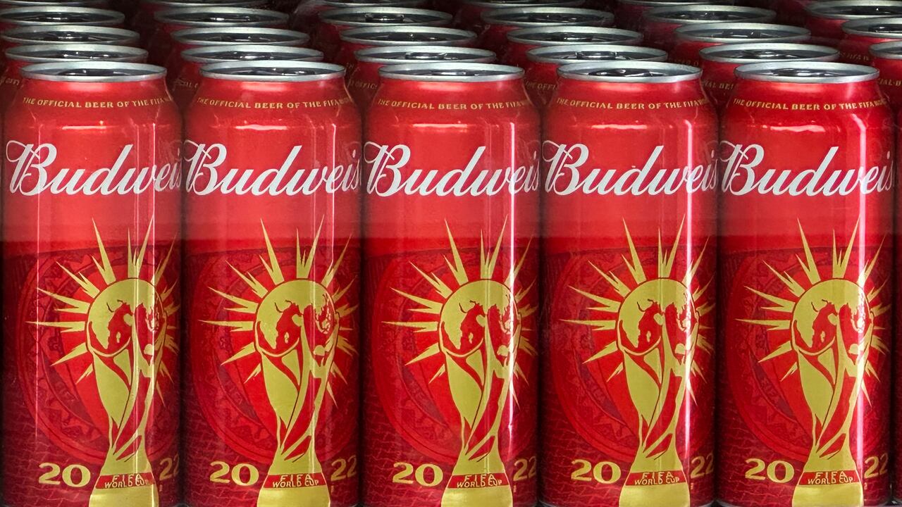 Cans of Budweiser beer featuring the FIFA World Cup logo are displayed in Doha on November 18, 2022 ahead of the Qatar 2022 World Cup football tournament. - The sale of alcohol in Qatar is strictly regulated. (Photo by Patrick T. FALLON / AFP)