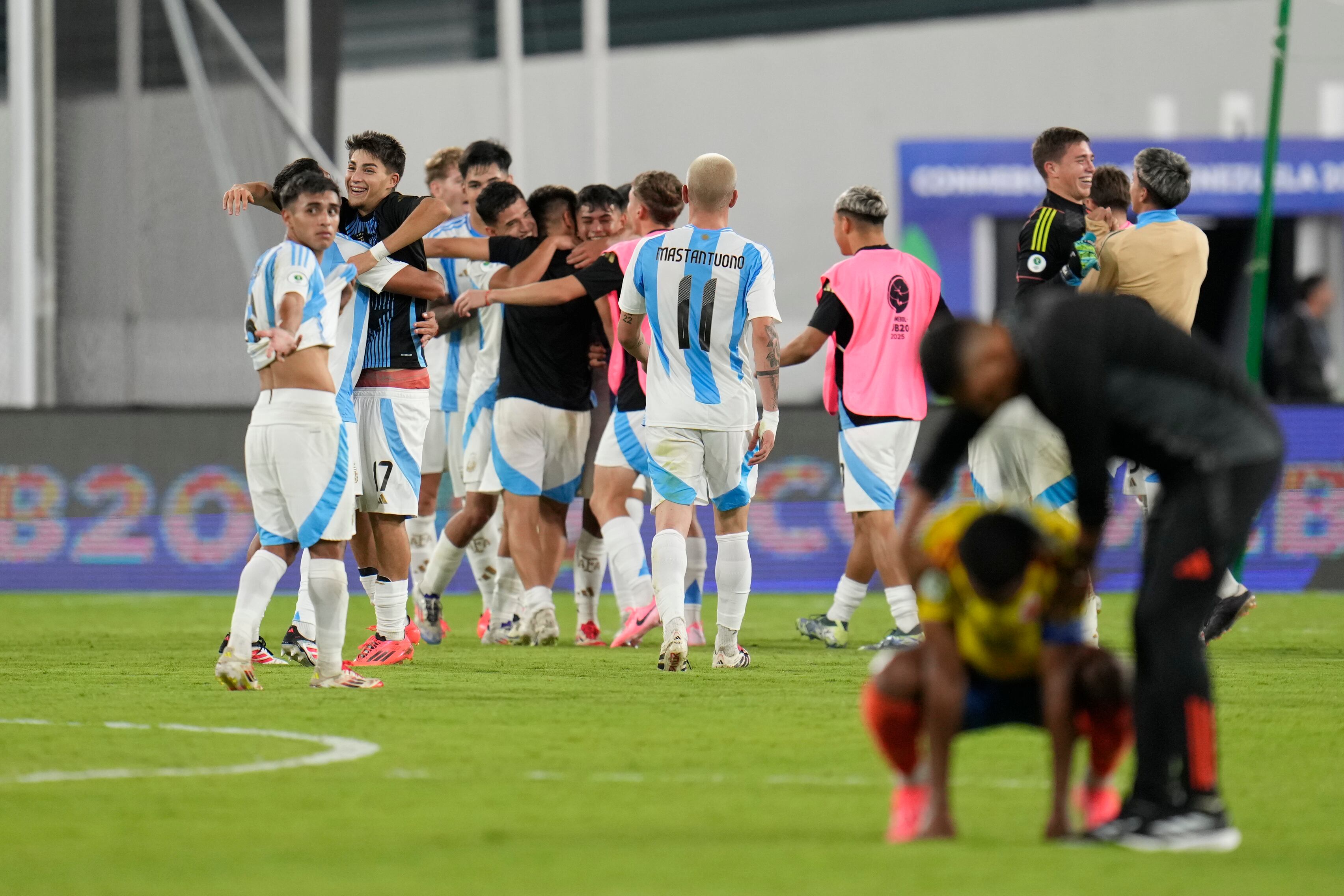 Argentinian players celebrate their victory over Colombia in a South American U-20 Championship final round soccer match in Caracas, Venezuela, Monday, Feb. 10, 2025. (AP Photo/Matias Delacroix)