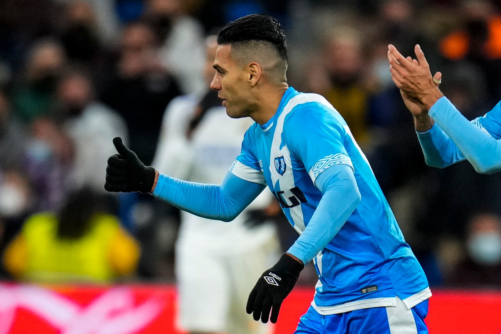 Rayo's Radamel Falcao celebrates afer scoring his side's first goal during a Spanish La Liga soccer match between Real Madrid and Rayo Vallecano at the Bernabeu stadium in Madrid, Spain, Saturday, Nov. 6, 2021. (AP Photo/Manu Fernandez)