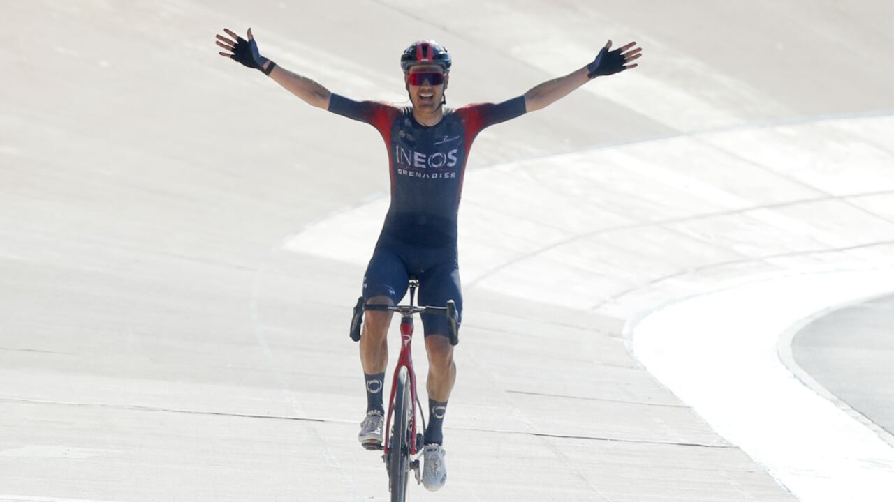 Netherland's Dylan Van Baarle celebrates as he crosses the finish line to win the Paris-Roubaix cycling race, a 257 kilometer (160 mile) one-day-race at the velodrome in Roubaix, northern France, Sunday, April 17, 2022. (AP/Michel Spingler)