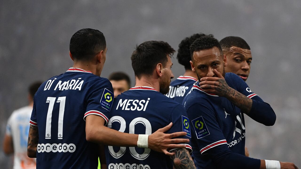 Paris Saint-Germain's Brazilian forward Neymar (2nd R), Paris Saint-Germain's Argentinian forward Lionel Messi (C), di Paris Saint-Germain's Argentinian midfielder Angel Di Maria (L) and Paris Saint-Germain's French forward Kylian Mbappe (R) celebrate a goal that was later invalidated by the video assistant referee (VAR) during the French L1 football match between Olympique Marseille (OM) and Paris Saint-Germain's (PSG) at Stade Velodrome in Marseille, southern France, on October 24, 2021. (Photo by CHRISTOPHE SIMON / AFP)