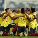 Colombia's Edwin Cardona, center, celebrates with teammates after scoring his side's opening goal against Ecuador during a Copa America soccer match at Arena Pantanal stadium in Cuiaba, Brazil, Sunday, June 13, 2021. (AP Photo/Bruna Prado)