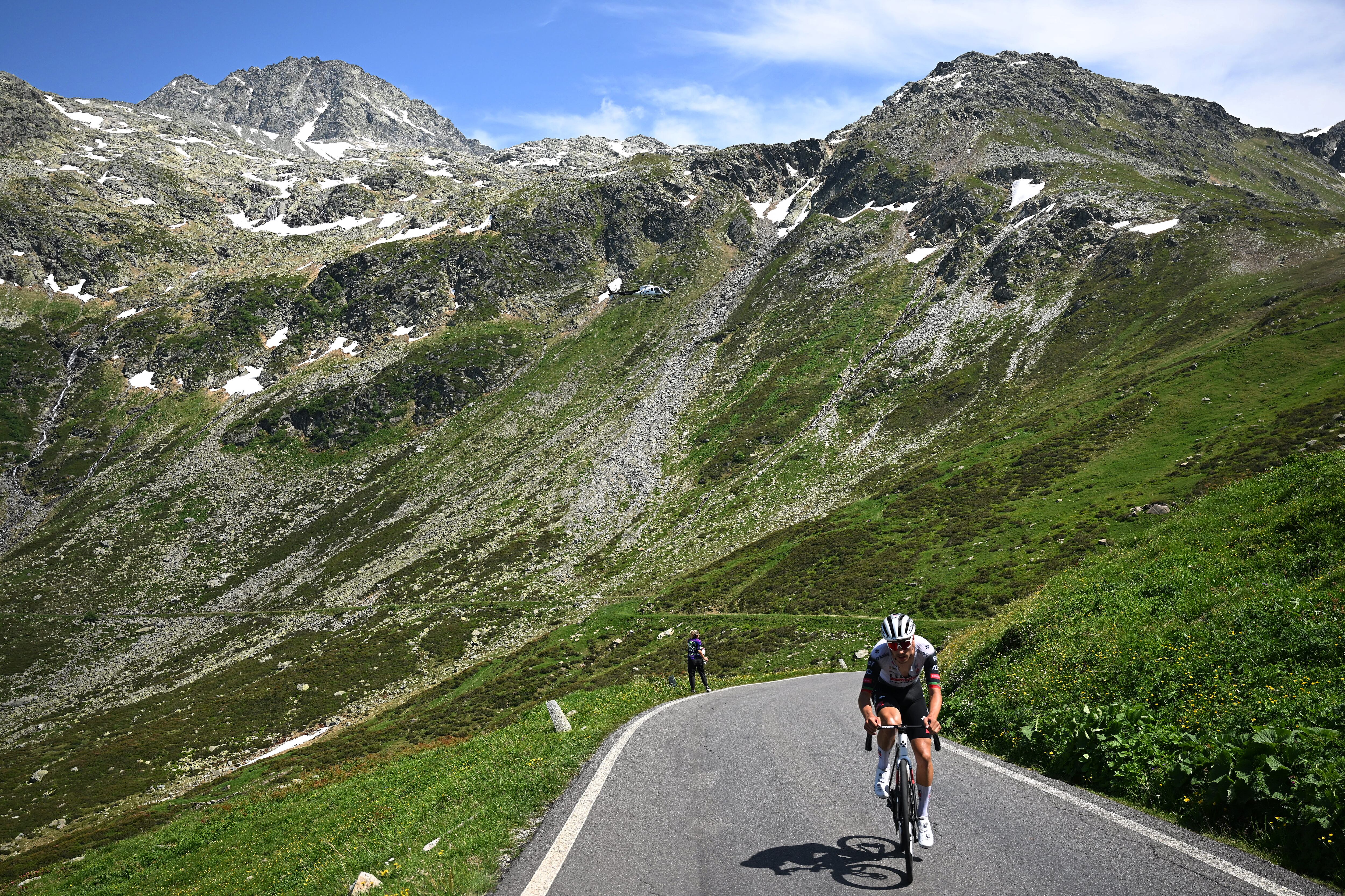 PIURO, SWITZERLAND - JUNE 18: Joao Almeida of Portugal and UAE Team Emirates - XRG attacks in the breakaway climbing to the Splugen pass (2110m) landscape during the 88th Tour de Suisse, Stage 4 a 193.2km stage from Heiden to Piuro (Valchiavenna) / #UCIWT / on June 18, 2025 in Piuro, Switzerland. (Photo by Tim de Waele/Getty Images)