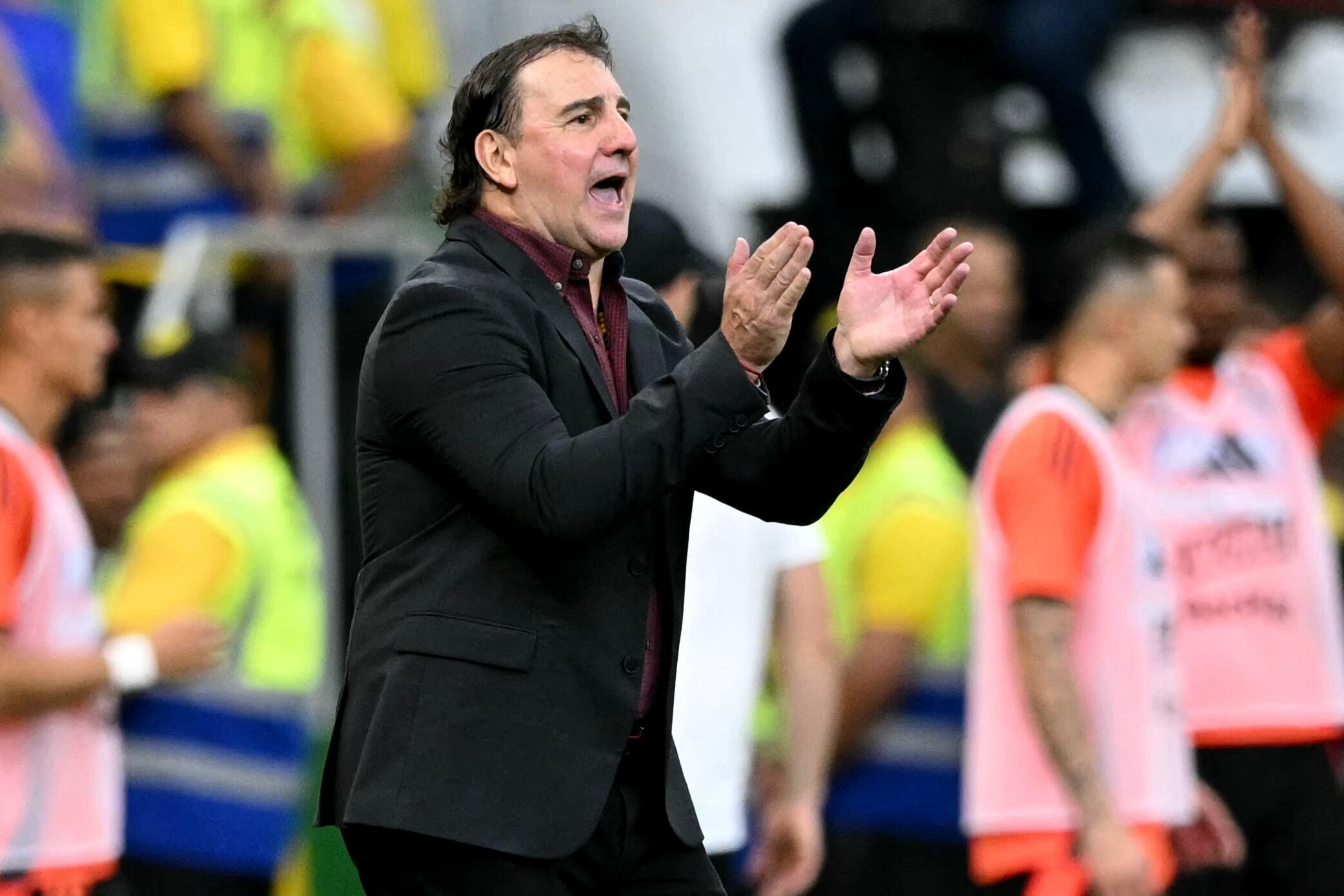 Colombia's Argentine head coach Nestor Lorenzo gives instructions during the 2026 FIFA World Cup South American qualifiers football match between Brazil and Colombia, at the Mane Garrincha stadium in Brasilia, on March 20, 2025. (Photo by EVARISTO SA / AFP)