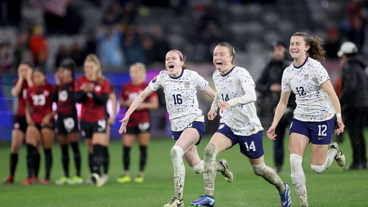 SAN DIEGO, CALIFORNIA - MARCH 06: Rose Lavelle #16, Emily Sonnett #14, and Tierna Davidson #12 of the United States celebrate after beating Canada 2-2 (3-1) in a penalty shoot-out during the 2024 Concacaf W Gold Cup semifinals at Snapdragon Stadium on March 06, 2024 in San Diego, California. Sean M. Haffey/Getty Images/AFP (Photo by Sean M. Haffey / GETTY IMAGES NORTH AMERICA / Getty Images via AFP)