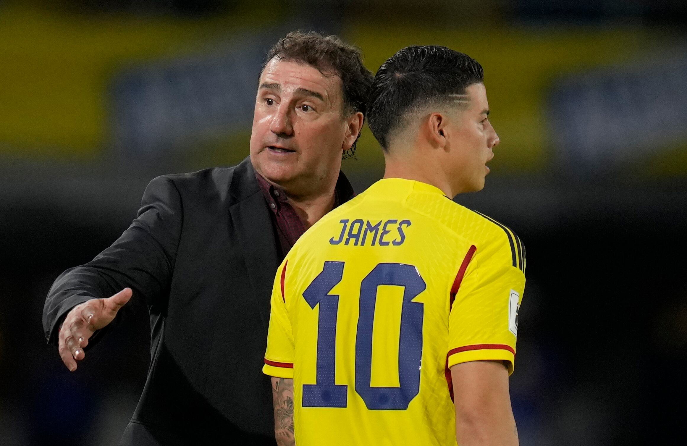 Colombia's James Rodriguez, right, enters the pitch as substitute player during a qualifying soccer match for the FIFA World Cup 2026 against Venezuela at Metropolitano stadium in Barranquilla, Colombia, Thursday, Sept. 7, 2023. (AP Photo/Ricardo Mazalan)