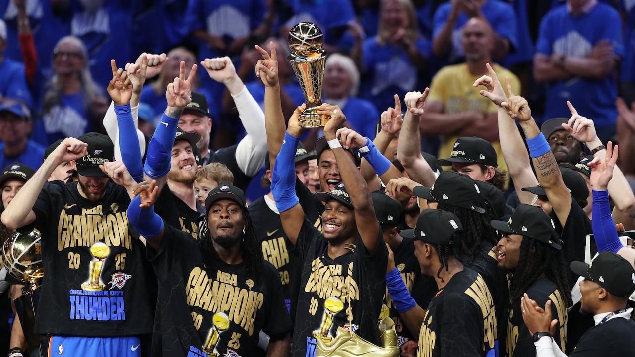 OKLAHOMA CITY, OKLAHOMA - JUNE 22: Shai Gilgeous-Alexander #2 of the Oklahoma City Thunder celebrates with the Bill Russell NBA Finals Most Valuable Player trophy after defeating the Indiana Pacers 103-91 in Game Seven of the 2025 NBA Finals at Paycom Center on June 22, 2025 in Oklahoma City, Oklahoma. NOTE TO USER: User expressly acknowledges and agrees that, by downloading and or using this photograph, User is consenting to the terms and conditions of the Getty Images License Agreement. (Photo by Justin Ford/Getty Images)