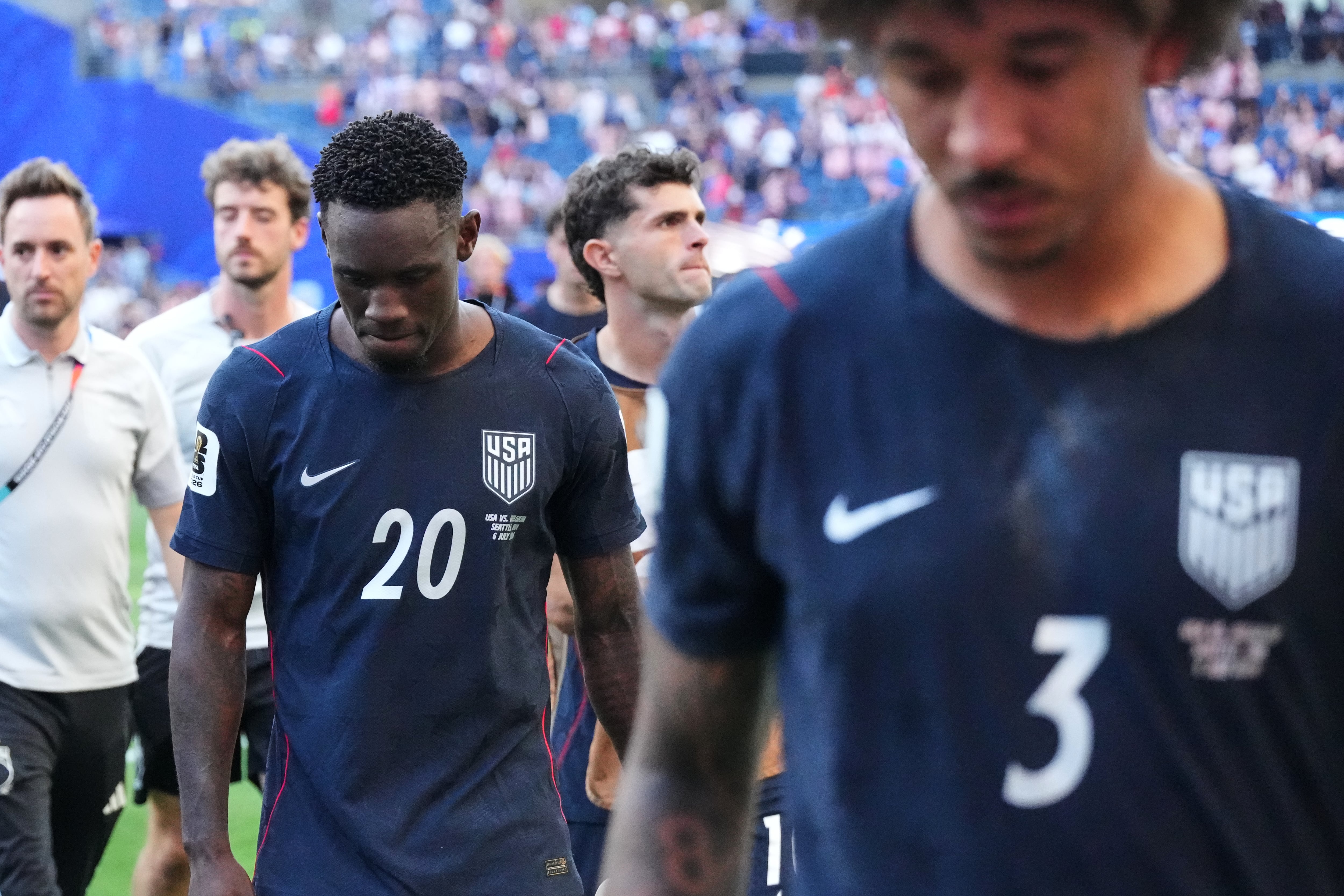 United States' Folarin Balogun (20) walks off the pitch after losing to Belgium in their World Cup round of 16 soccer match in Seattle, Monday, July 6, 2026. (AP Photo/Ted S. Warren)