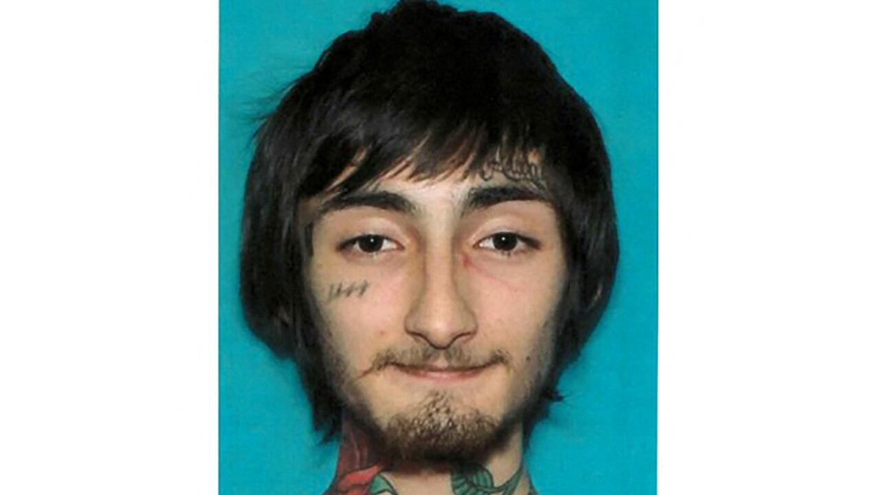 This handout image courtesy of the City of Highland Park shows Robert "Bobby" E. Crimo III, a person of interest named by Highland Park Police Chief Lou Jogmen, in the shooting at a Fourth of July parade on July 4, 2022 in Highland Park, Illinois. - A shooter opened fire Monday during a parade to mark US Independence Day in the state of Illinois, killing at least six people, officials said.