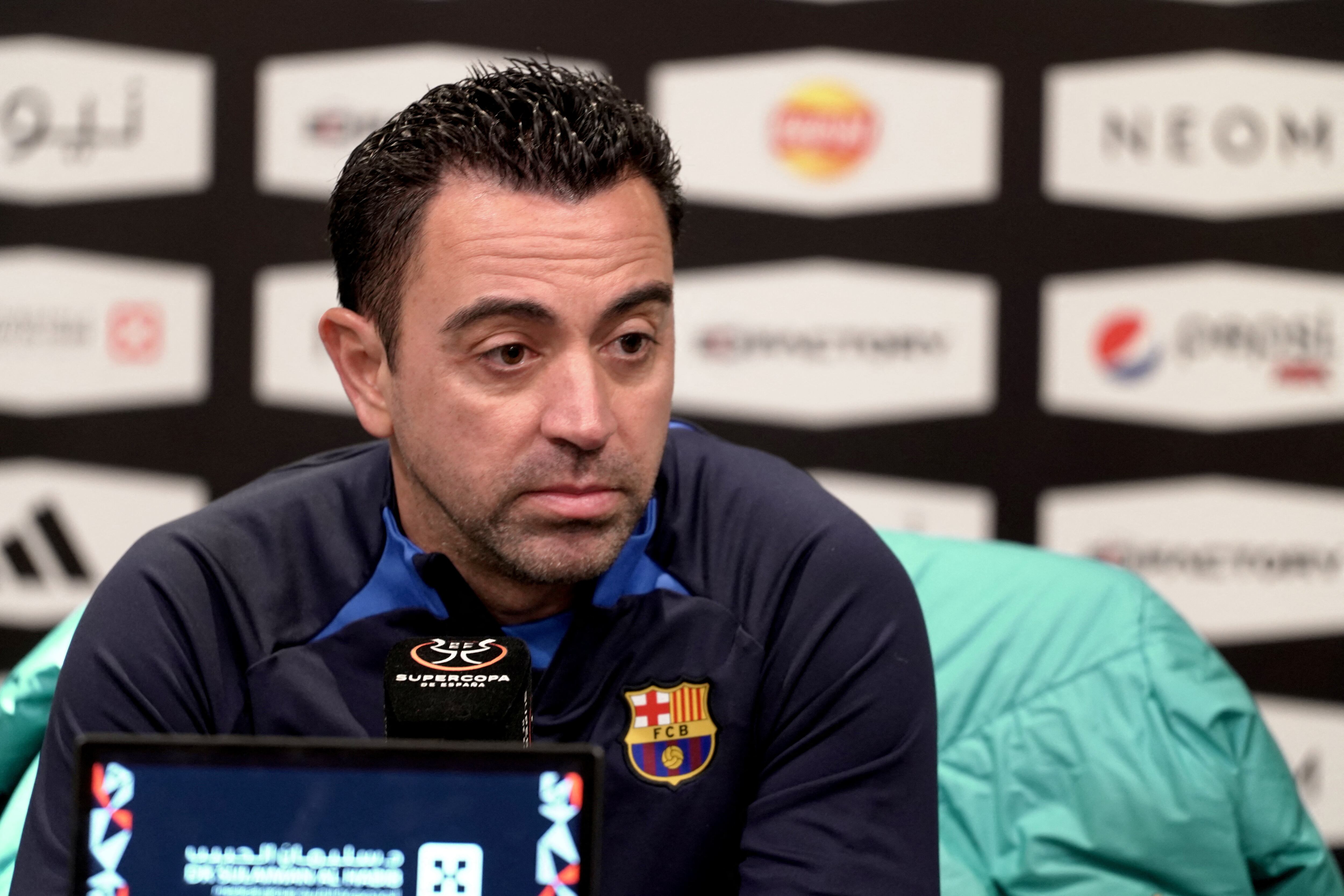 Soccer Football - Spanish Super Cup - FC Barcelona Press Conference - Al Hilal Football Club, Riyadh, Saudi Arabia - January 11, 2023  FC Barcelona coach Xavi during the press conference  REUTERS/Mohammed Benmansour