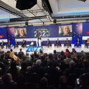 Panel economia público asistente