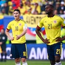 TEMUCO, CHILE - JUNE 21: James Rodriguez and Jackson Martinez of Colombia look dejected after the 2015 Copa America Chile Group C match between Colombia and Peru at Municipal Bicentenario Germán Becker Stadium on June 21, 2015 in Temuco, Chile. (Photo by Miguel Tovar/LatinContent via Getty Images)