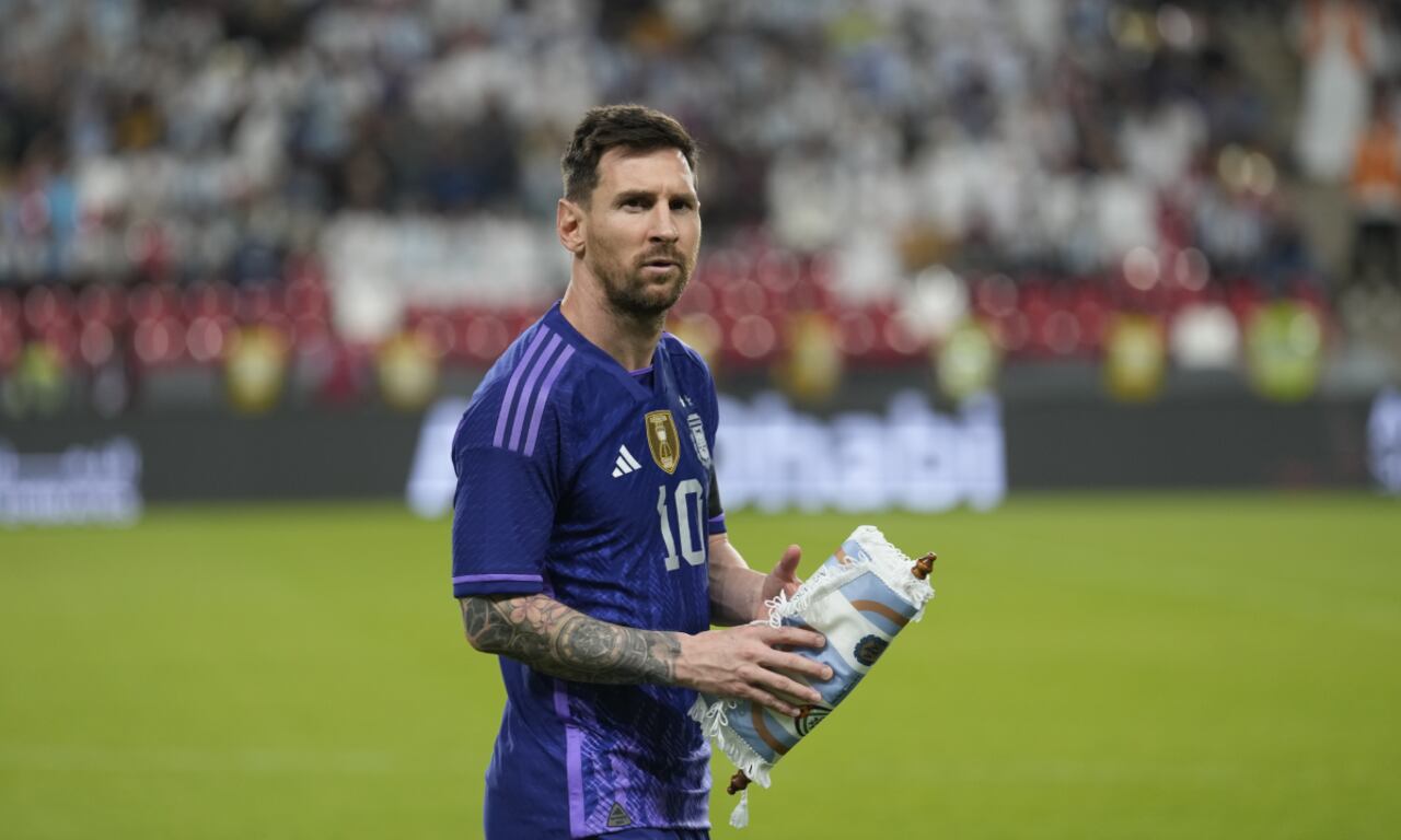 Argentina's Lionel Messi walks on the pitch before a friendly soccer match between Argentina and United Arab Emirates in Abu Dhabi, Wednesday, Nov. 16, 2022. (AP/Kamran Jebreili)