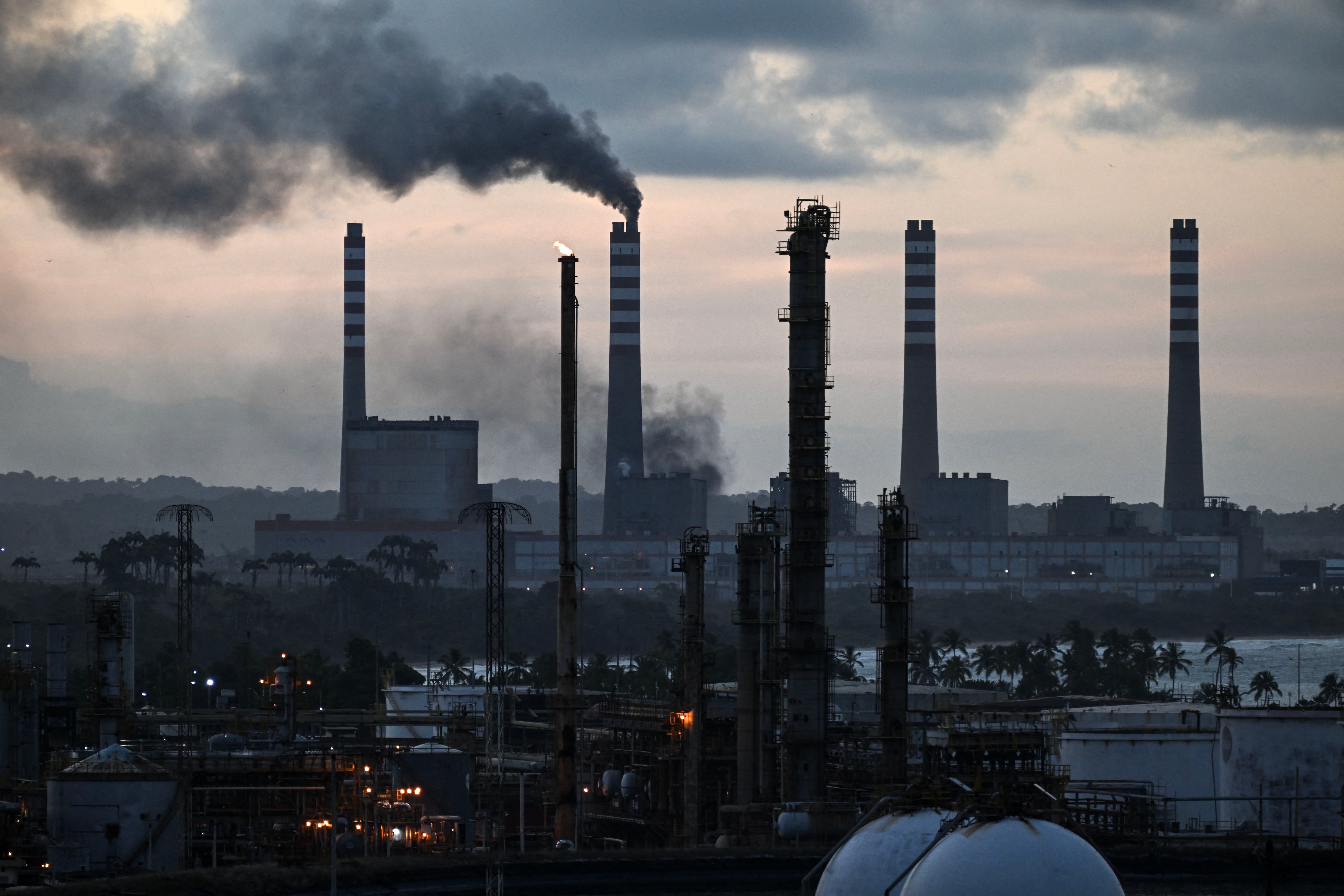 (FILES) View of the refinery El Palito in Puerto Cabello, Carabobo state, Venezuela on January 22, 2026. Venezuela's defense minister on September 1, 2026, said the army supported the country's multibillion-dollar oil deal with the US. (Photo by Ronaldo SCHEMIDT / AFP)