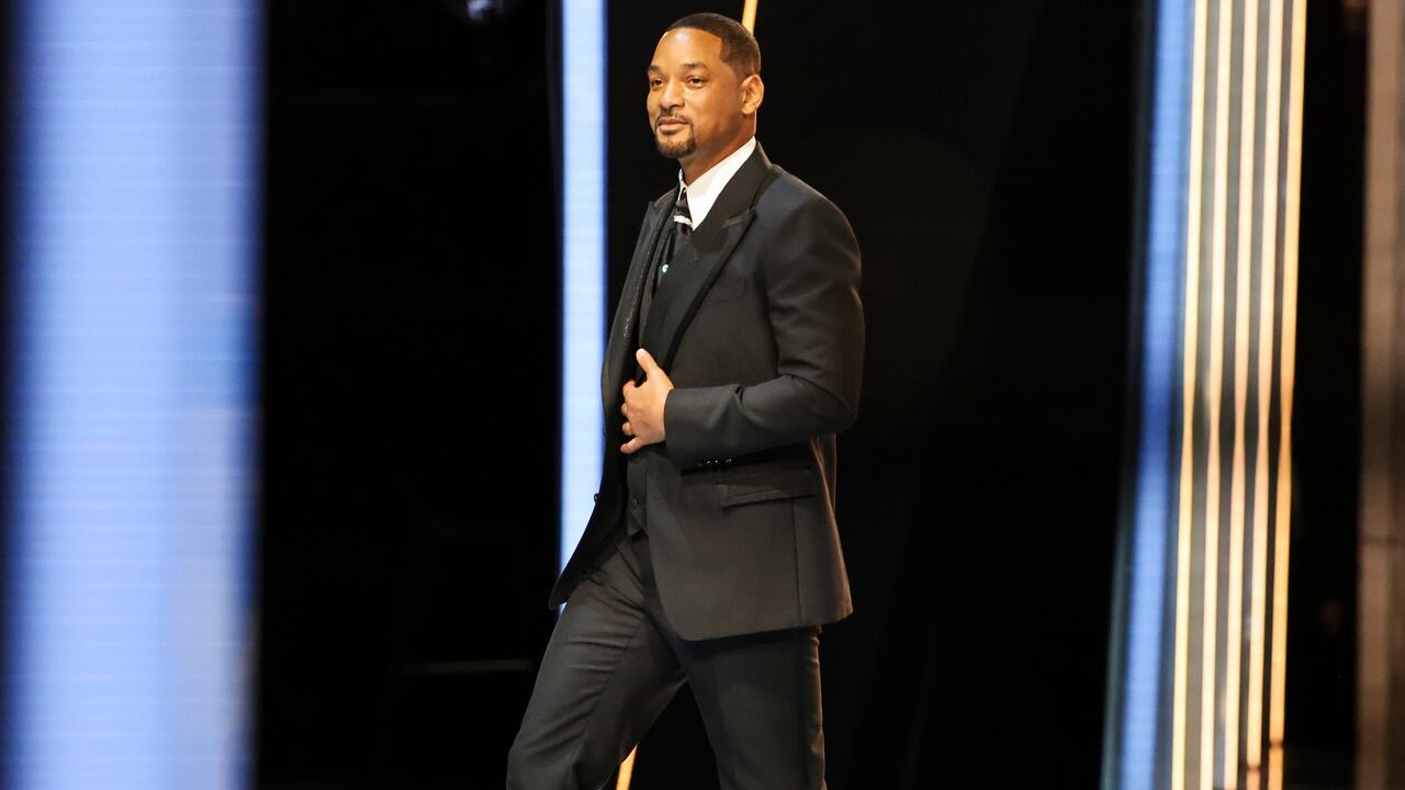 HOLLYWOOD, CA - March 27, 2022: Will Smith holds his Oscar for best actor for King Richard during the show at the 94th Academy Awards at the Dolby Theatre at Ovation Hollywood on Sunday, March 27, 2022. (Robert Gauthier / Los Angeles Times via Getty Images)