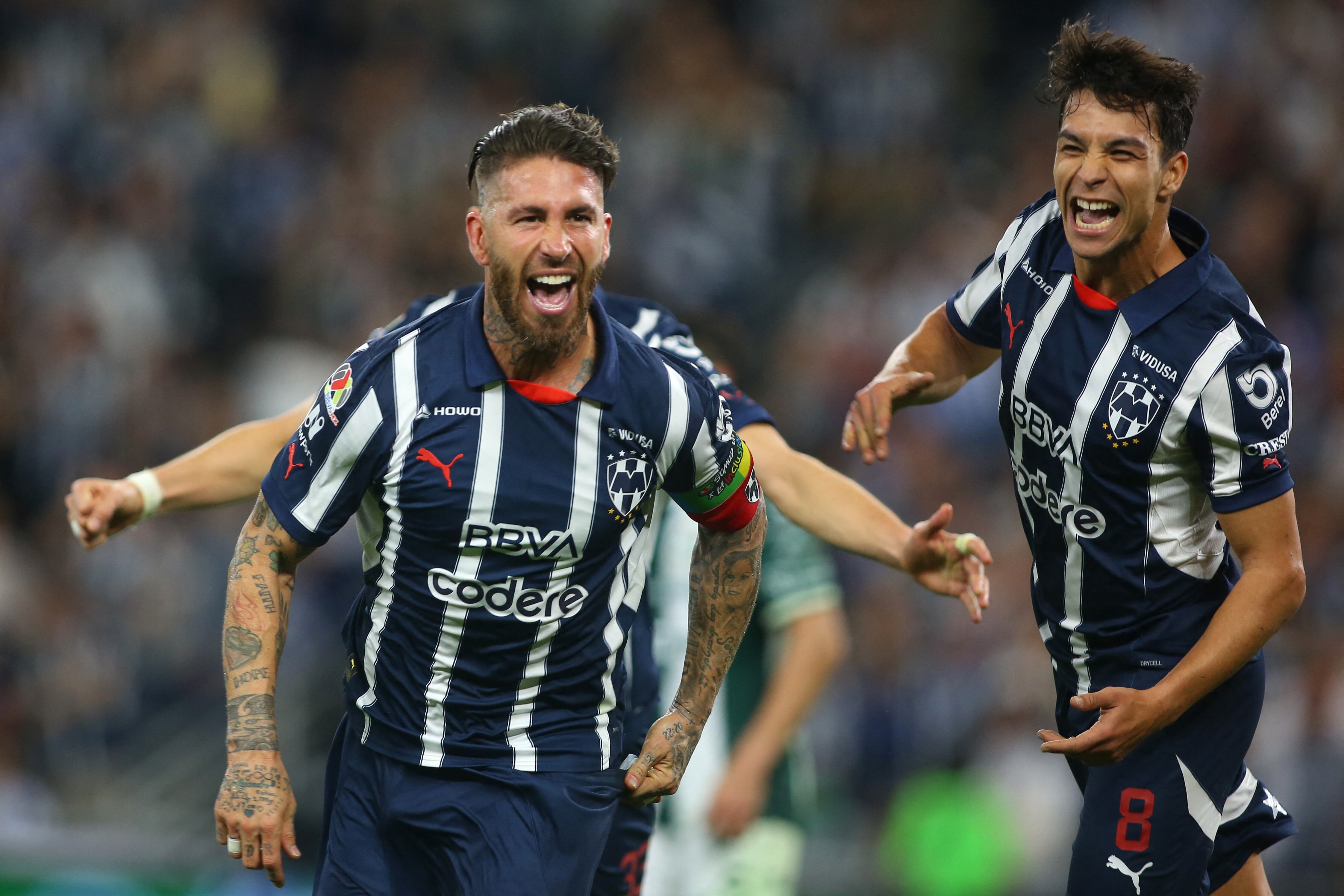 Monterrey's Spanish defender #93 Sergio Ramos celebrates next to teammate Spanish midfielder #08 Oliver Torres after scoring his team second goal during the Liga MX Clausura football match between Monterrey and Santos at the BBVA Stadium in Monterrey, Mexico on March 2, 2025. (Photo by Julio Cesar AGUILAR / AFP)