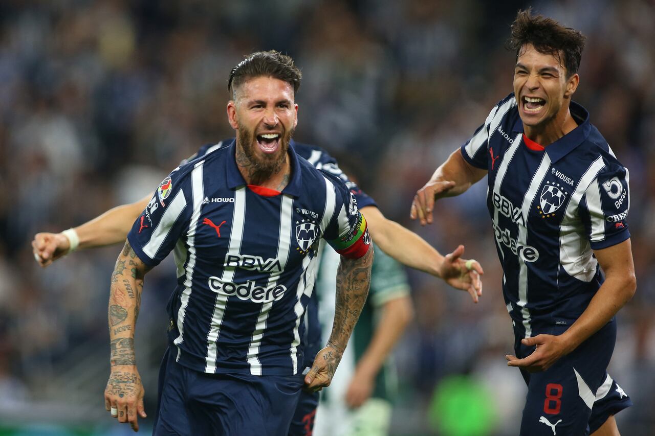Monterrey's Spanish defender #93 Sergio Ramos celebrates next to teammate Spanish midfielder #08 Oliver Torres after scoring his team second goal during the Liga MX Clausura football match between Monterrey and Santos at the BBVA Stadium in Monterrey, Mexico on March 2, 2025. (Photo by Julio Cesar AGUILAR / AFP)
