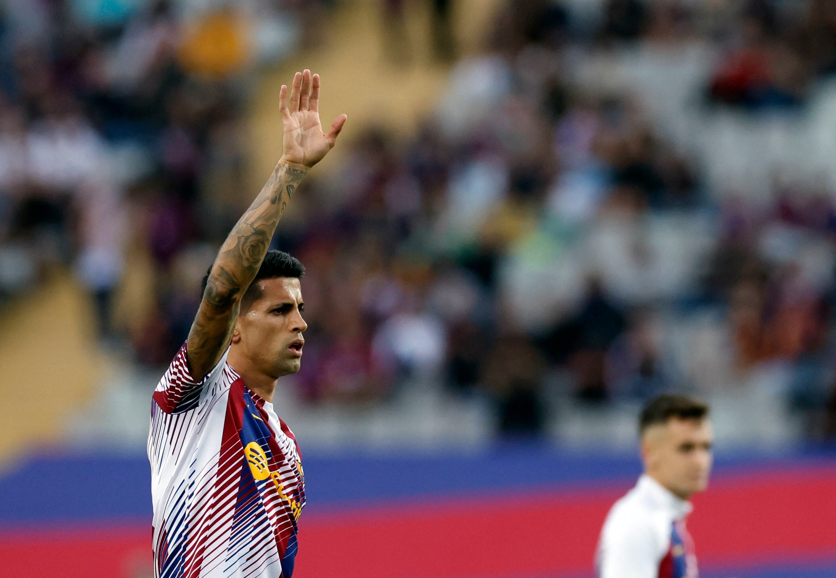 Soccer Football - Champions League - Group H - FC Barcelona v Shakhtar Donetsk - Estadi Olimpic Lluis Companys, Barcelona, Spain - October 25, 2023  FC Barcelona's Joao Cancelo during the warm up before the match REUTERS/Albert Gea