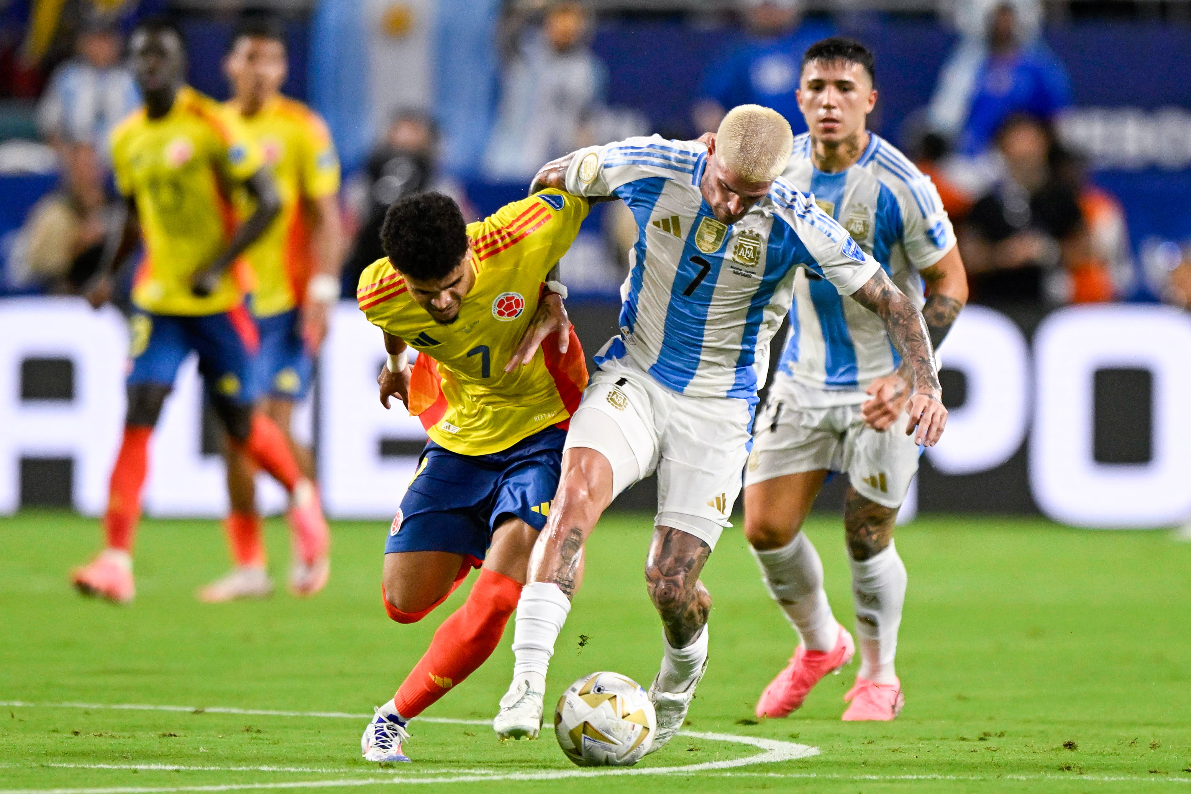 MIAMI GARDENS, UNITED STATES - JULY 15: Luis Diaz of Colombia battles for the ball with Rodrigo De Paul of Argentina during the CONMEBOL Copa America USA 2024 match between Argentina and Colombia at Hard Rock Stadium on July 15, 2024 in Miami Gardens, United States. (Photo by Pablo Morano/BSR Agency/Getty Images)
