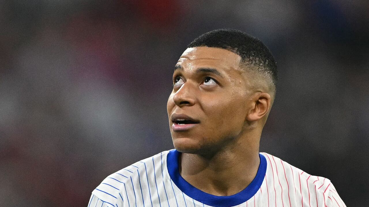 France's forward #10 Kylian Mbappe reacts to a missed chance during the UEFA Euro 2024 semi-final football match between Spain and France at the Munich Football Arena in Munich on July 9, 2024. (Photo by Fabrice COFFRINI / AFP)