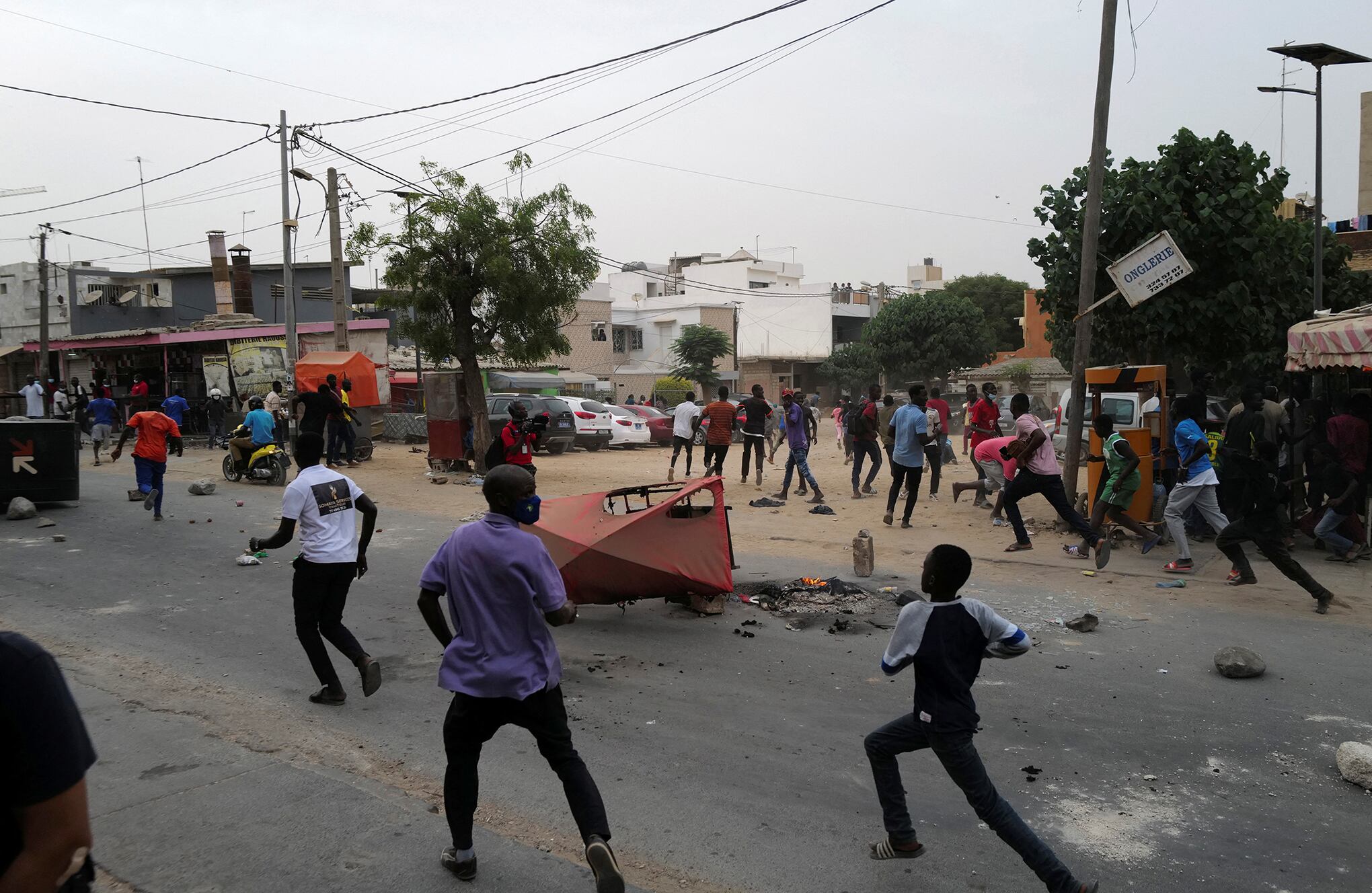 En imágenes : fuertes disturbios en llevan acabo en Senegal