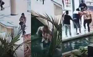 La mujer venía distraída con su teléfono celular y terminó probando el agua luego de tropezar.