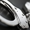 closeup on handcuffs. selective focus.