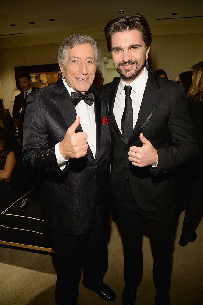 LAS VEGAS, NV - DECEMBER 02:  Singer Tony Bennett (L) and recording artist Juanes pose backstage during "Sinatra 100: An All-Star GRAMMY Concert" celebrating the late Frank Sinatra's 100th birthday at the Encore Theater at Wynn Las Vegas on December 2, 2015 in Las Vegas, Nevada. The show will air on CBS on December 6.  (Photo by Kevin Mazur/WireImage)