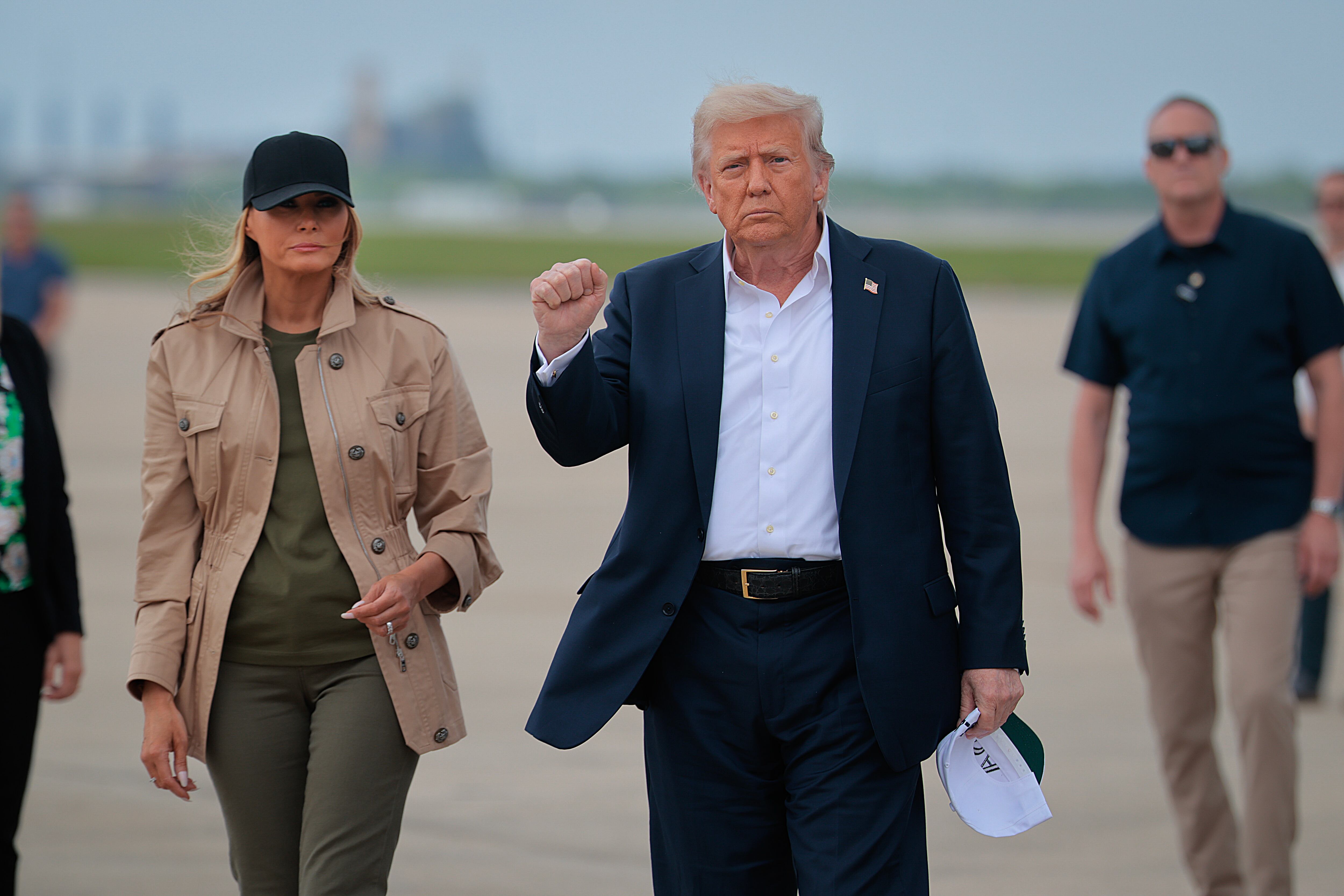 SAN ANTONIO, TEXAS - JULY 11: President Donald Trump and first lady Melania Trump arrive at Lackland Air Force Base before heading to Kerrville, Texas where they plan to visit with state and local leaders, first responders and victims of last week's flash flooding on July 11, 2025 in San Antonio, Texas. Trump traveled to Texas one week after flash flooding along the Guadalupe River swept through cities, mobile home parks and summer camps, killing 120 people. Ninety-six of those killed were in Kerr County, where the toll includes at least 36 children.(Photo by Chip Somodevilla/Getty Images)
