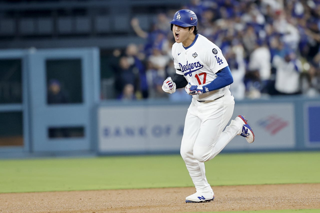 Los Angeles, CA October  27, 2025: Los Angeles Dodgers two-way player Shohei Ohtani (17) reacts as he rounds the base after his solo home run in the seventh inning during game three of the World Series between the Los Angeles Dodgers and the Toronto Blue Jays at Dodger Stadium on Monday, October 27, 2025 in Los Angeles, CA.(Gina Ferazzi / Los Angeles Times via Getty Images)