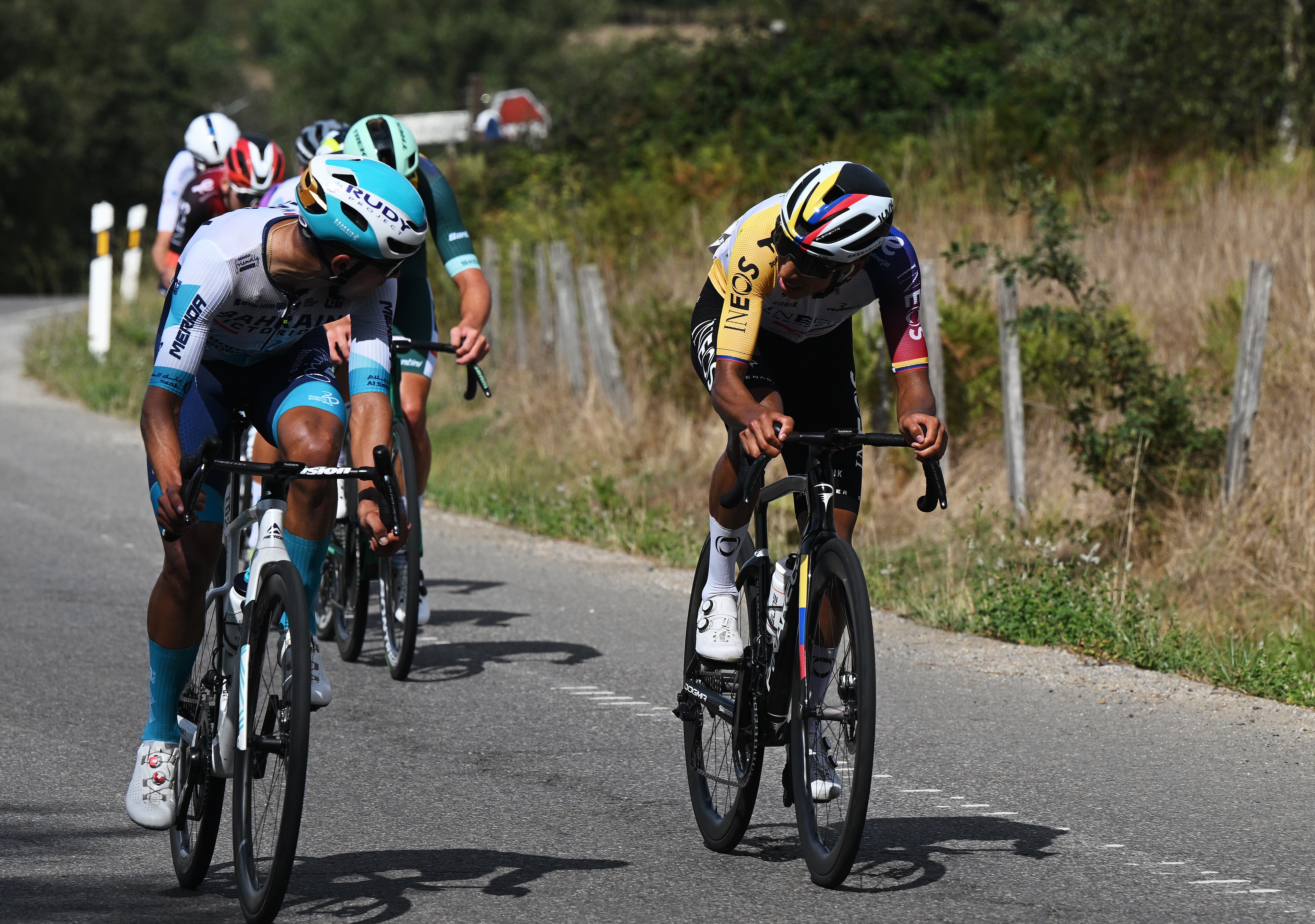 MONFORTE DE LEMOS, SPAIN - SEPTEMBER 07: (L-R) Santiago Buitrago of Colombia and Team Bahrain - Victorious and Egan Bernal of Colombia and Team INEOS Grenadiers compete in the chase group during the La Vuelta - 80th Tour of Spain 2025, Stage 15 a 167.8km stage from A Veiga-Vegadeo to Monforte de Lemos / #UCIWT / on September 07, 2025 in Monforte de Lemos, Spain. (Photo by Dario Belingheri/Getty Images)